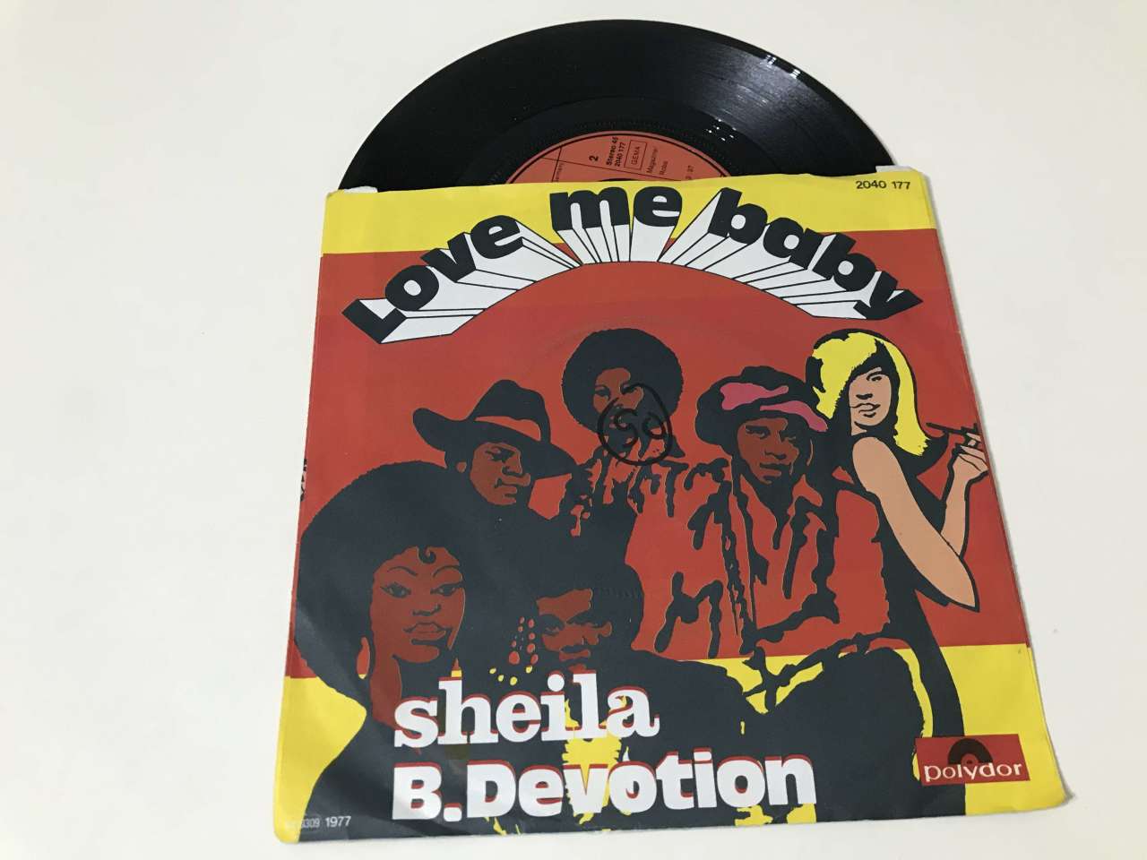 Sheila B. Devotion – Love Me Baby Plak, CD, DVD Satın Al